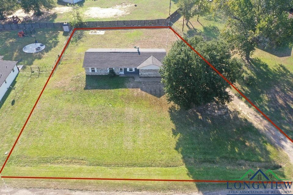 Image 1: View from above of property with property boundaries highlighted, Aerial View