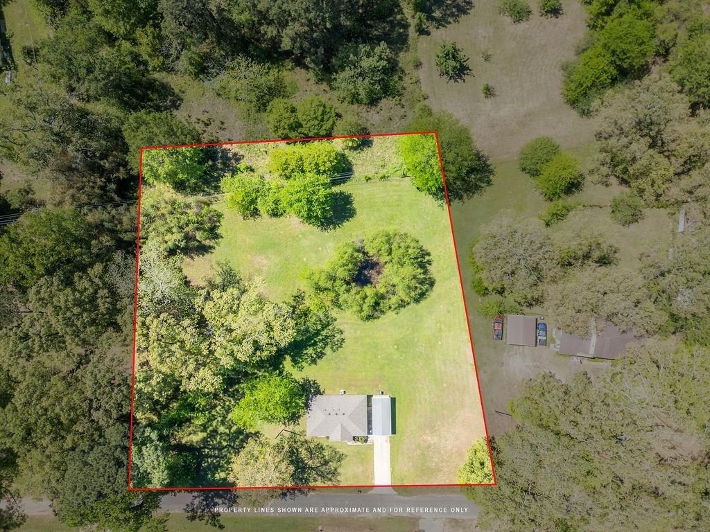Image 2: Aerial overview of property's location featuring property parcel outlined, Aerial View