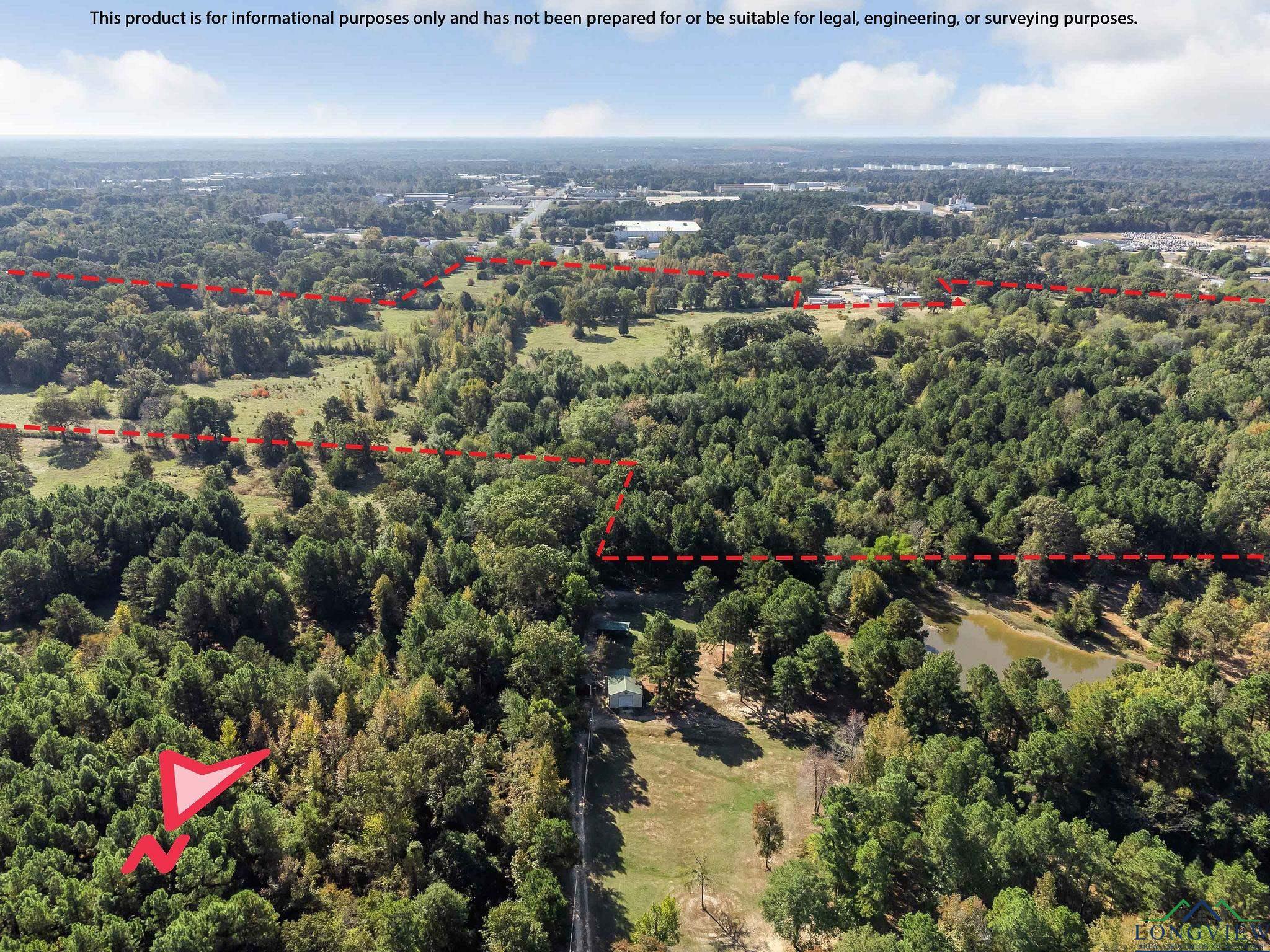 Image 2: Aerial overview of property's location featuring property boundaries highlighted and a large body of water, Aerial View