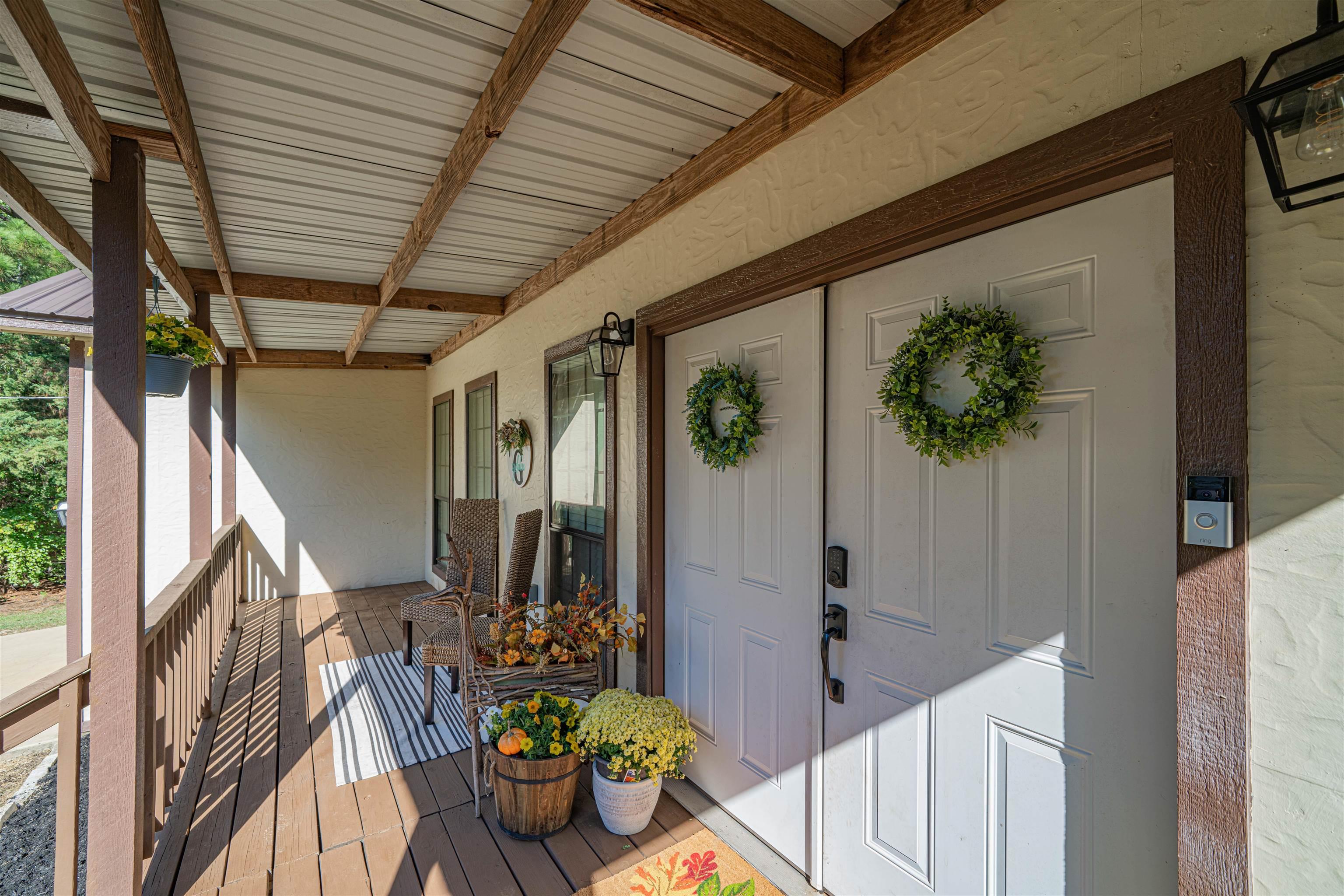 Image 2: Property entrance with covered porch, Entry