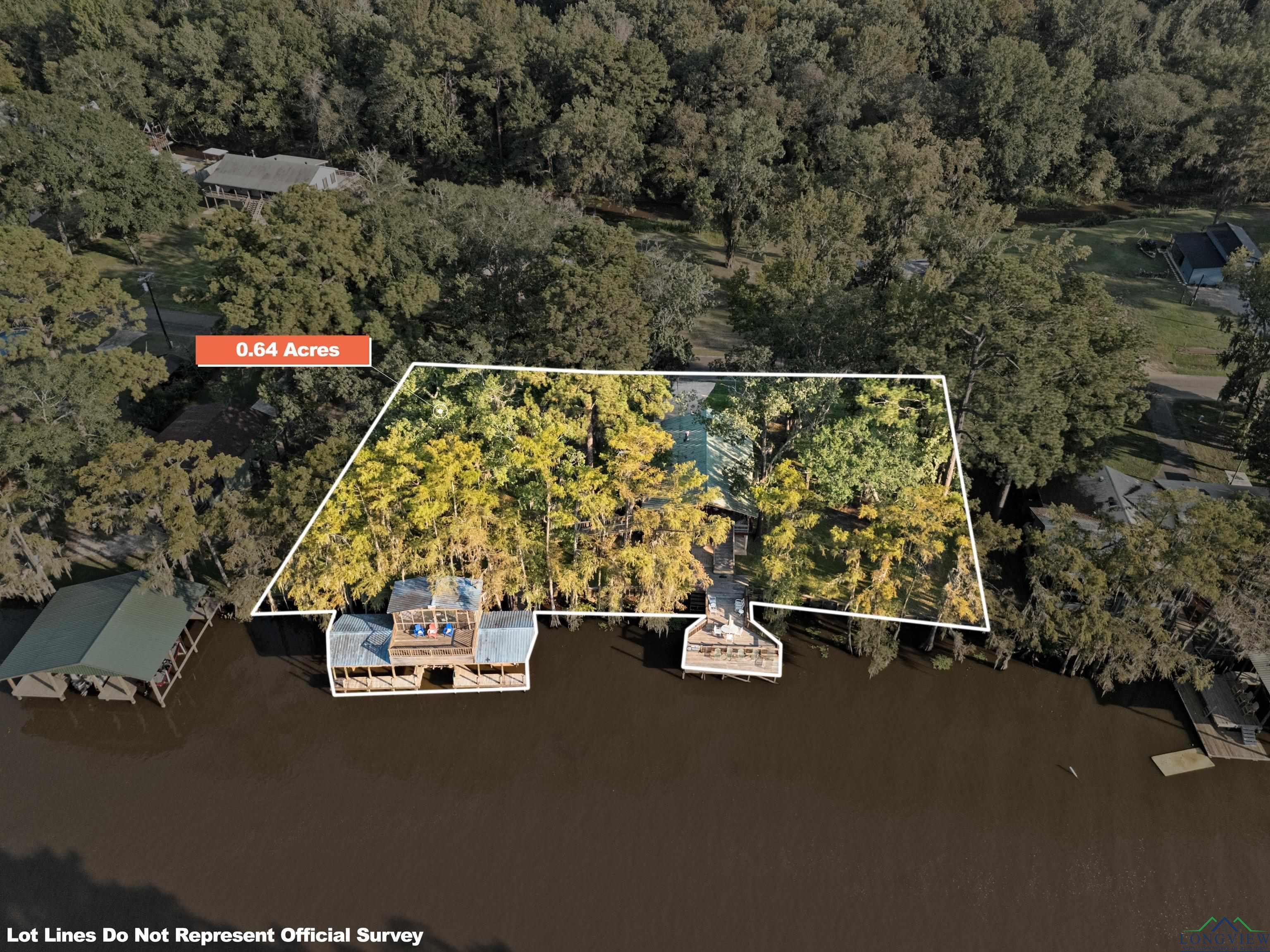 Image 2: Aerial view of property and surrounding area featuring property parcel outlined, Aerial View