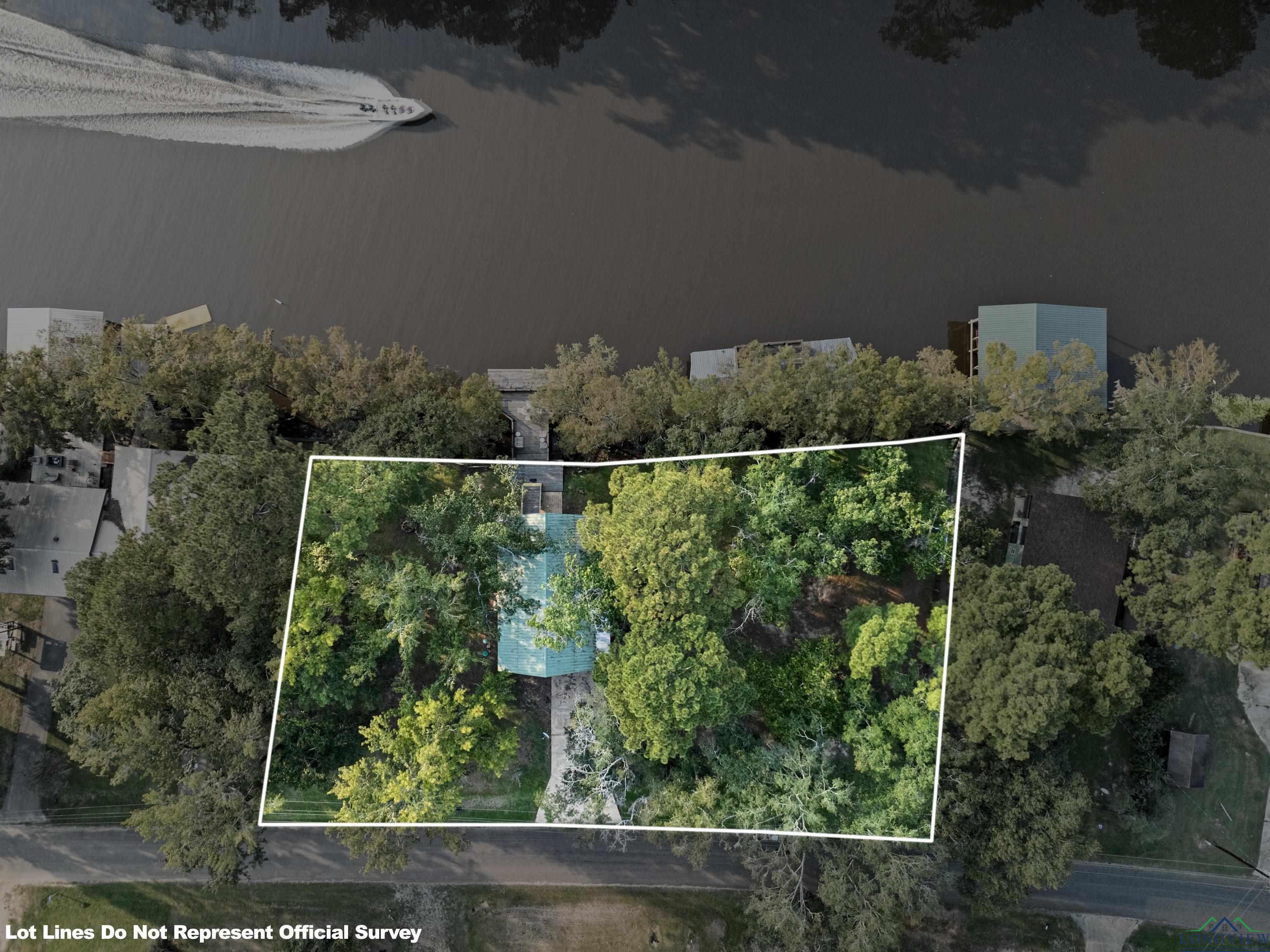 Image 3: Aerial overview of property's location with property parcel outlined, Aerial View