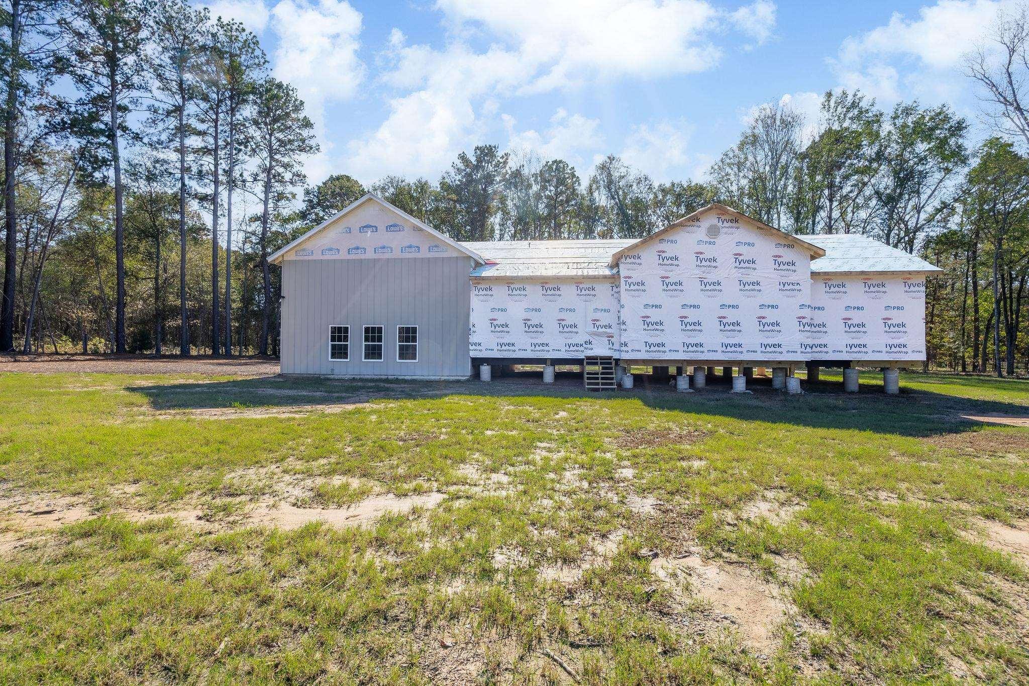 Image 2: Rear view of property with a yard, Back Of Structure