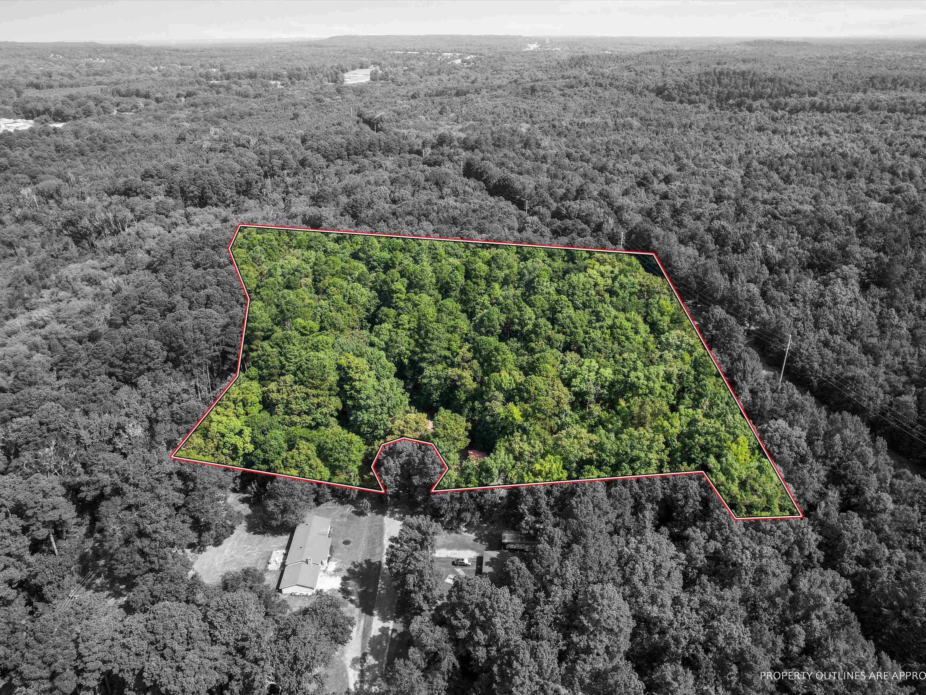 Image 1: Aerial overview of property's location with property parcel outlined, Aerial View