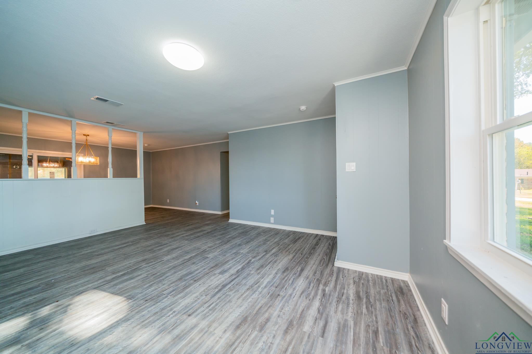 Image 3: Unfurnished room with wood finished floors and crown molding, Other