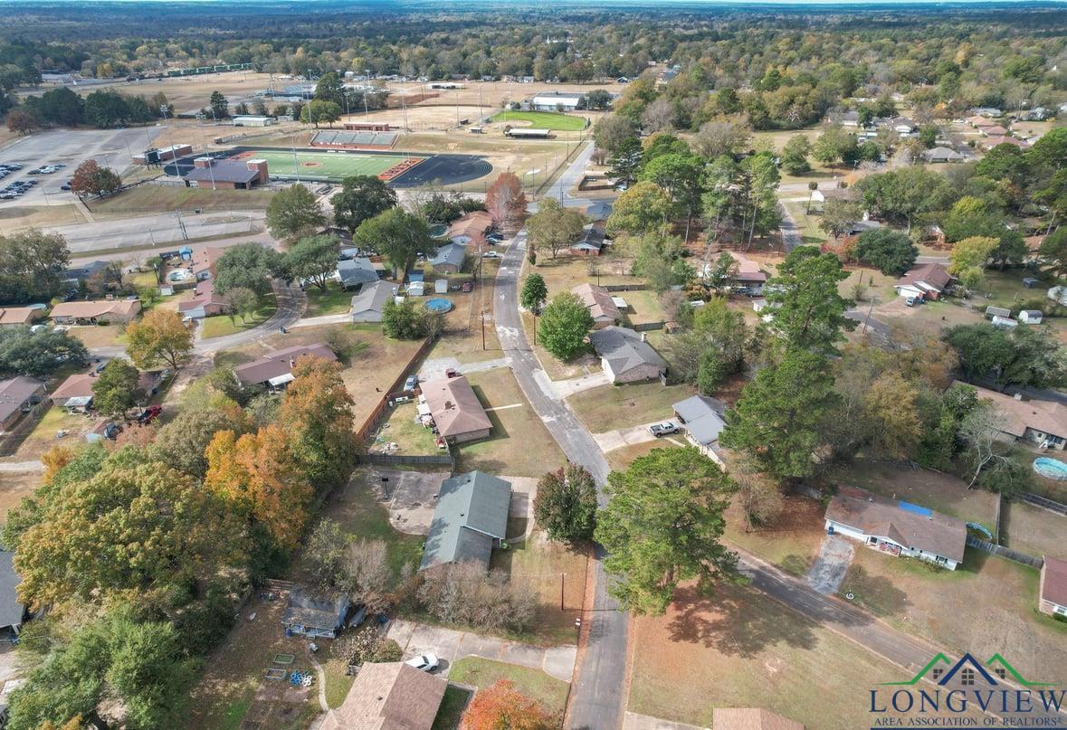 Image 3: Aerial view of property and surrounding area featuring nearby suburban area, Aerial View