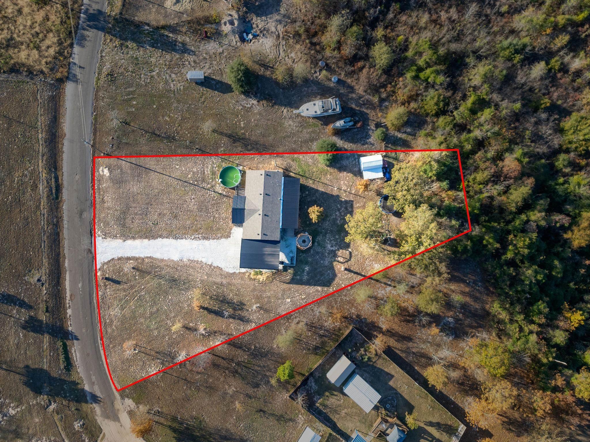 Image 2: Aerial overview of property's location with property boundaries highlighted, Aerial View