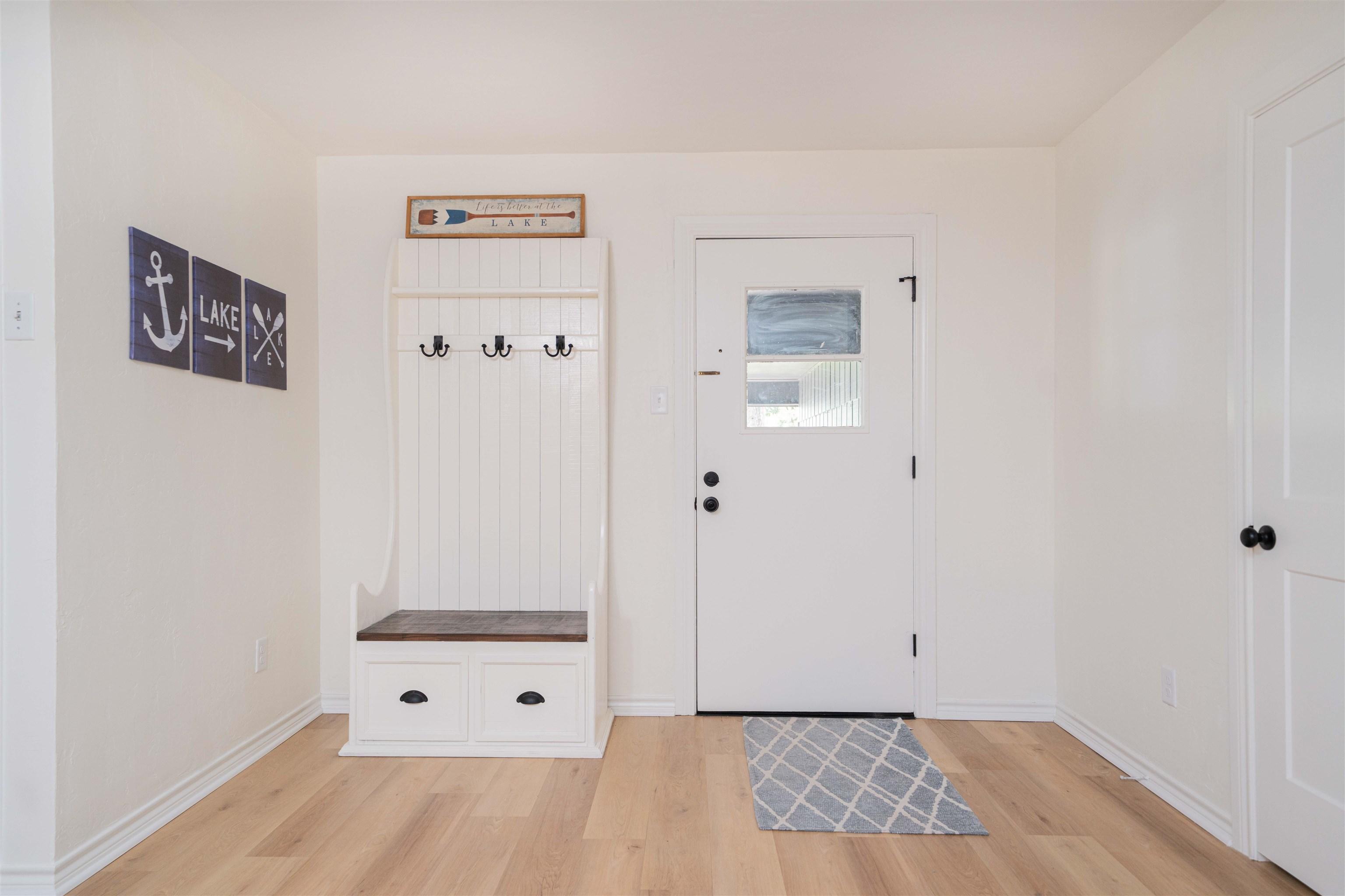 Image 2: Mudroom with light wood-style floors and baseboards, Mud Room