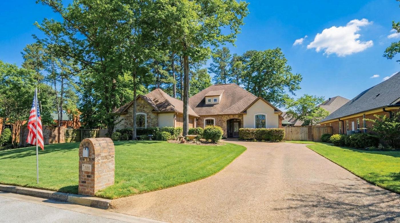Image 1: View of front facade featuring stone siding, Front Of Structure