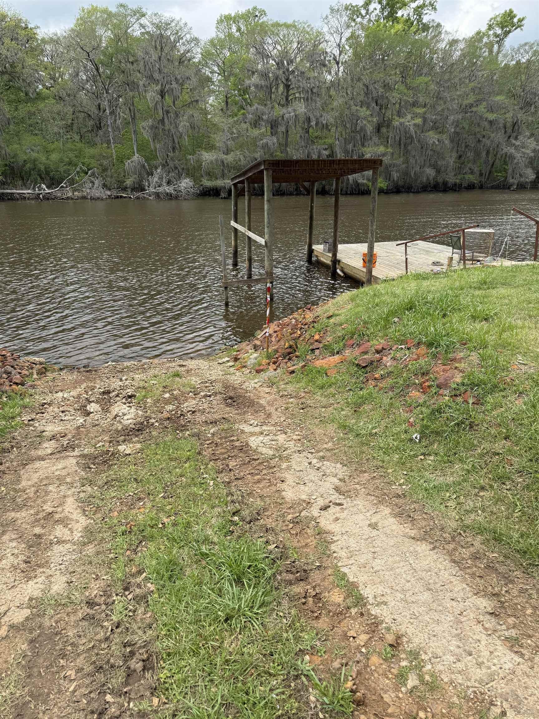 Image 1: Dock featuring a water view and a boat ramp, Dock