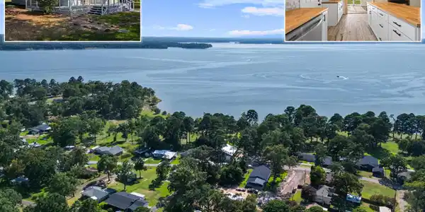 Image 1: Expansive lakefront community featuring mature trees and established residences, Aerial View