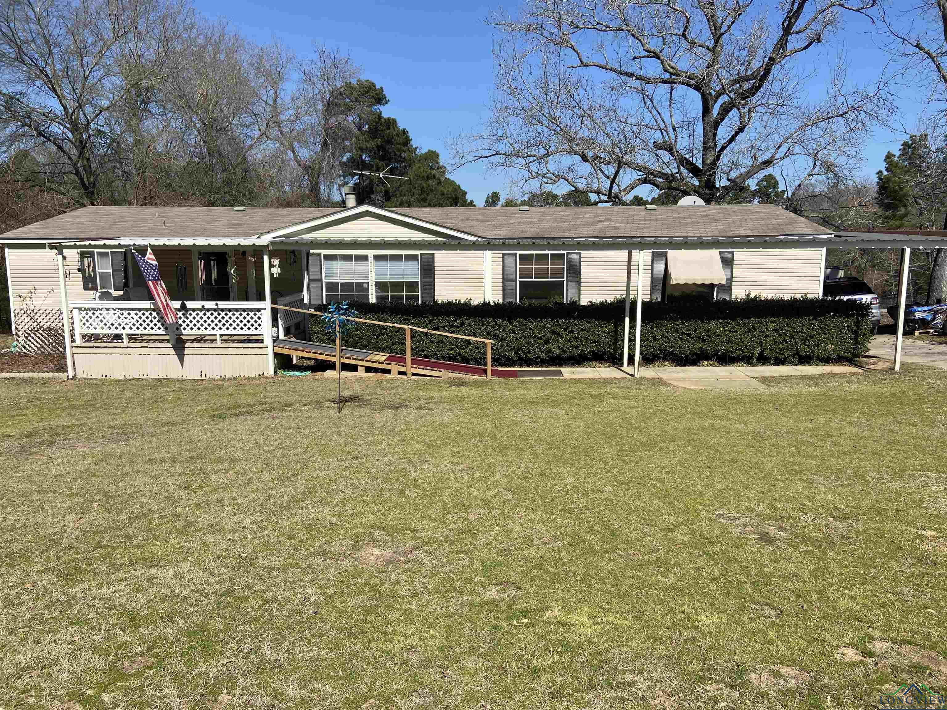 Image 0: View of front of house featuring a front yard, Front Of Structure