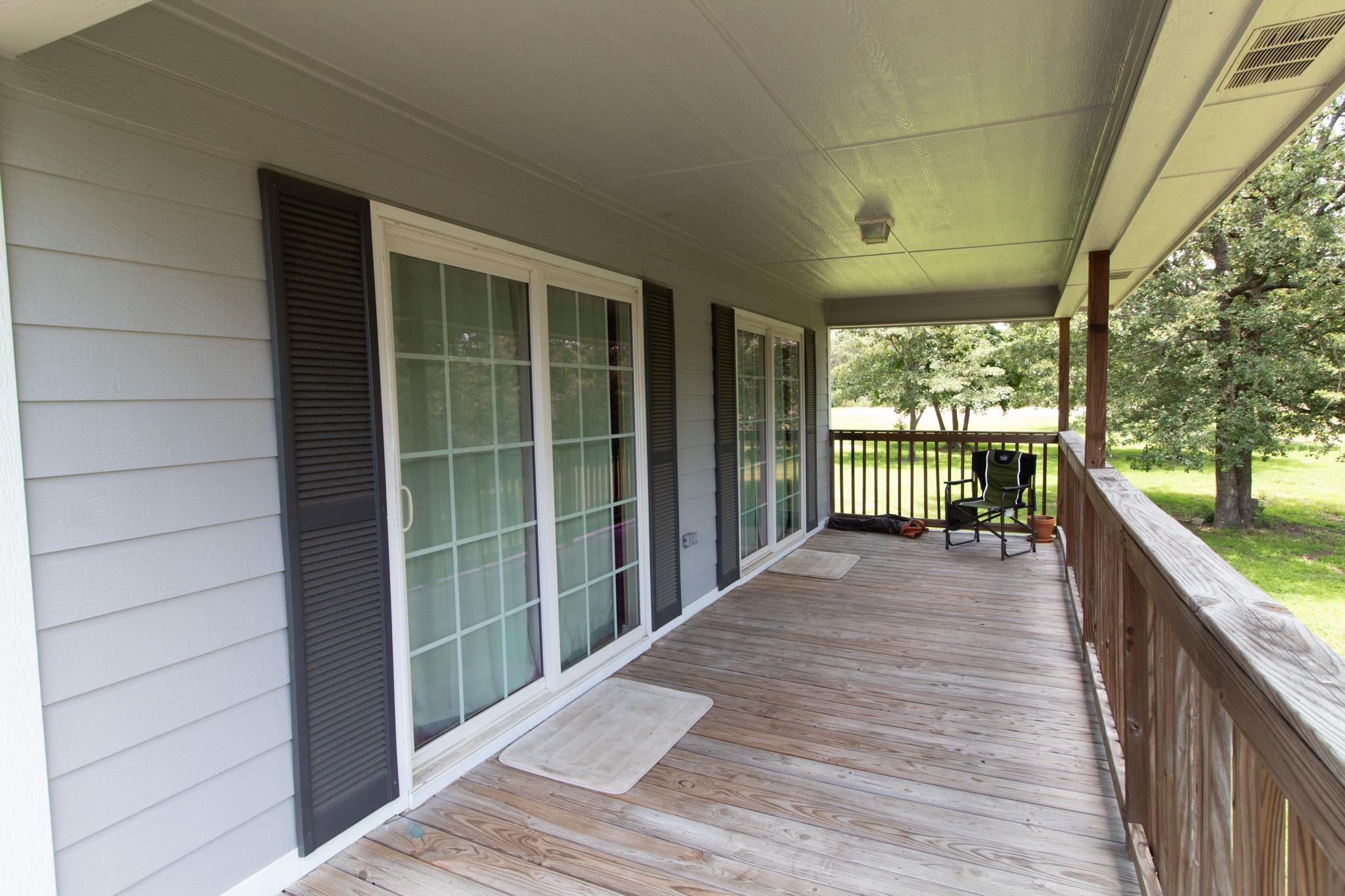Image 2: View of wooden porch, Deck