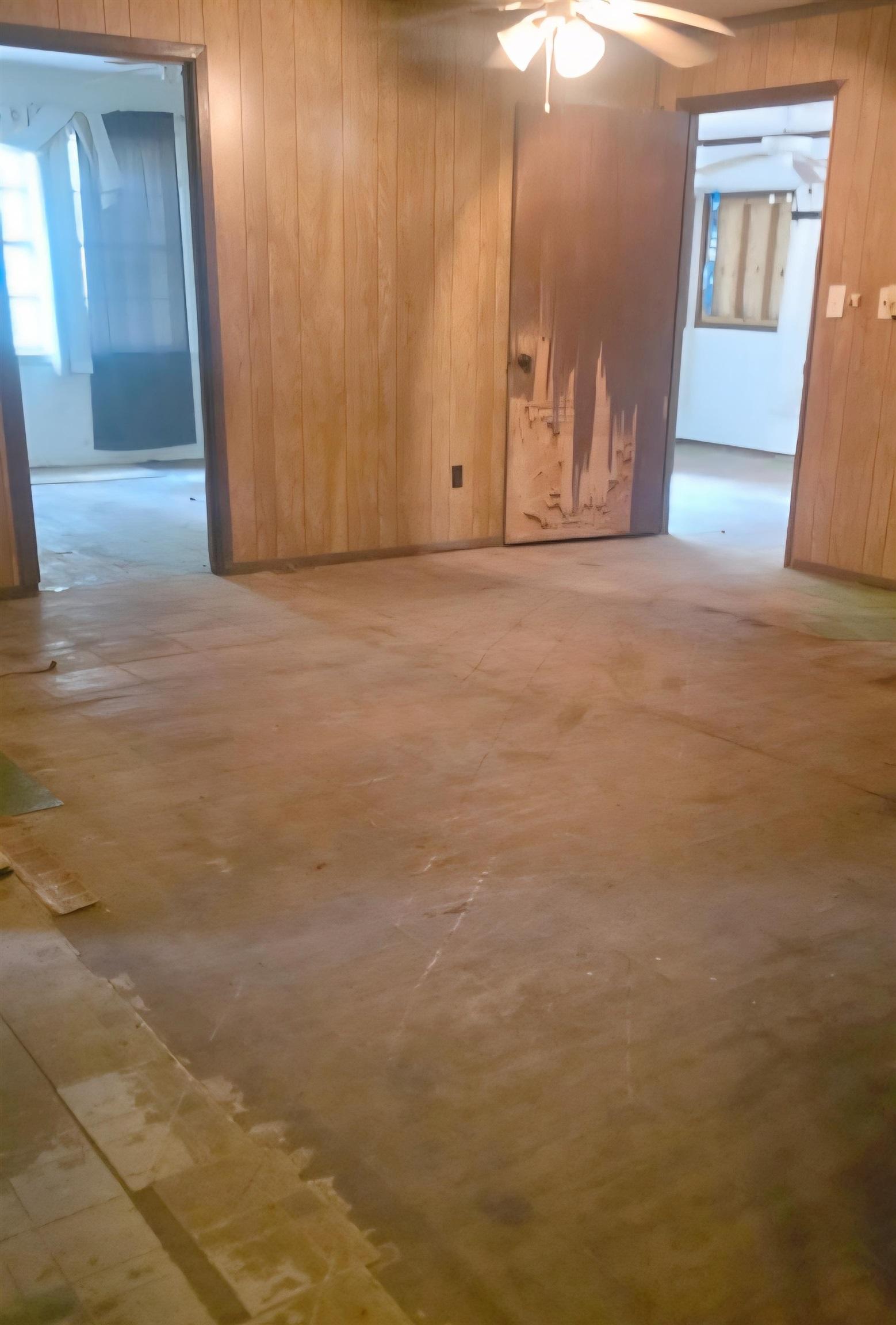 Image 1: Spare room featuring wooden walls and a ceiling fan, Other