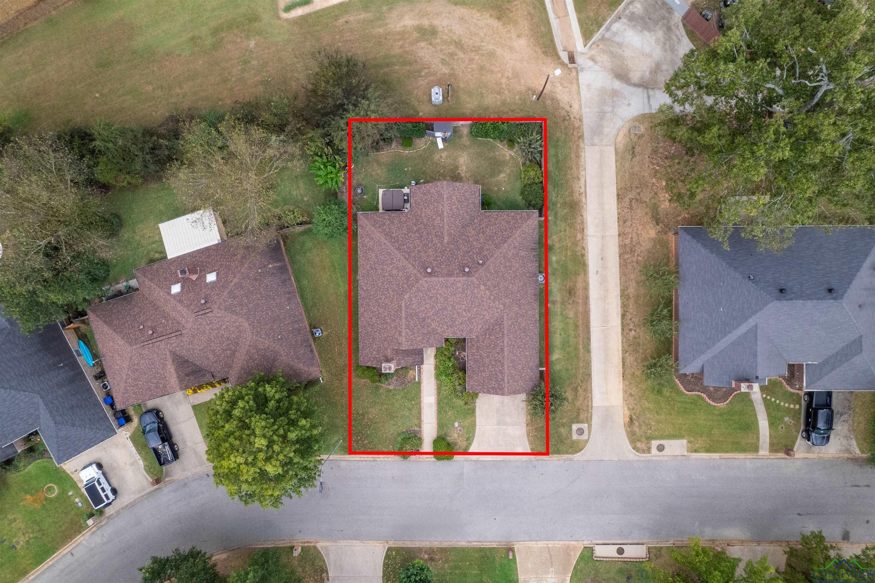 Image 1: Aerial view of property and surrounding area featuring property parcel outlined, Aerial View