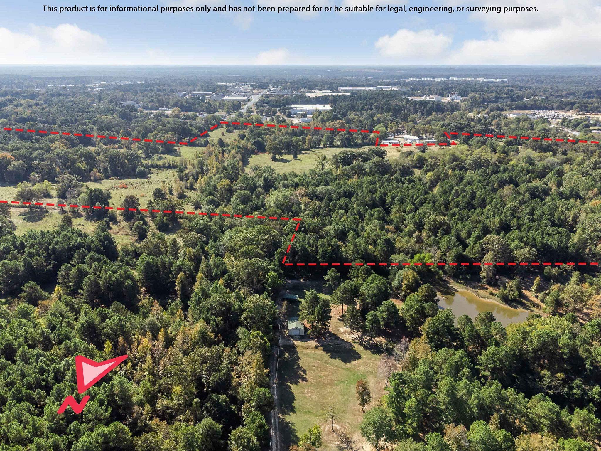 Image 2: Aerial overview of property's location featuring property boundaries highlighted and a large body of water, Aerial View