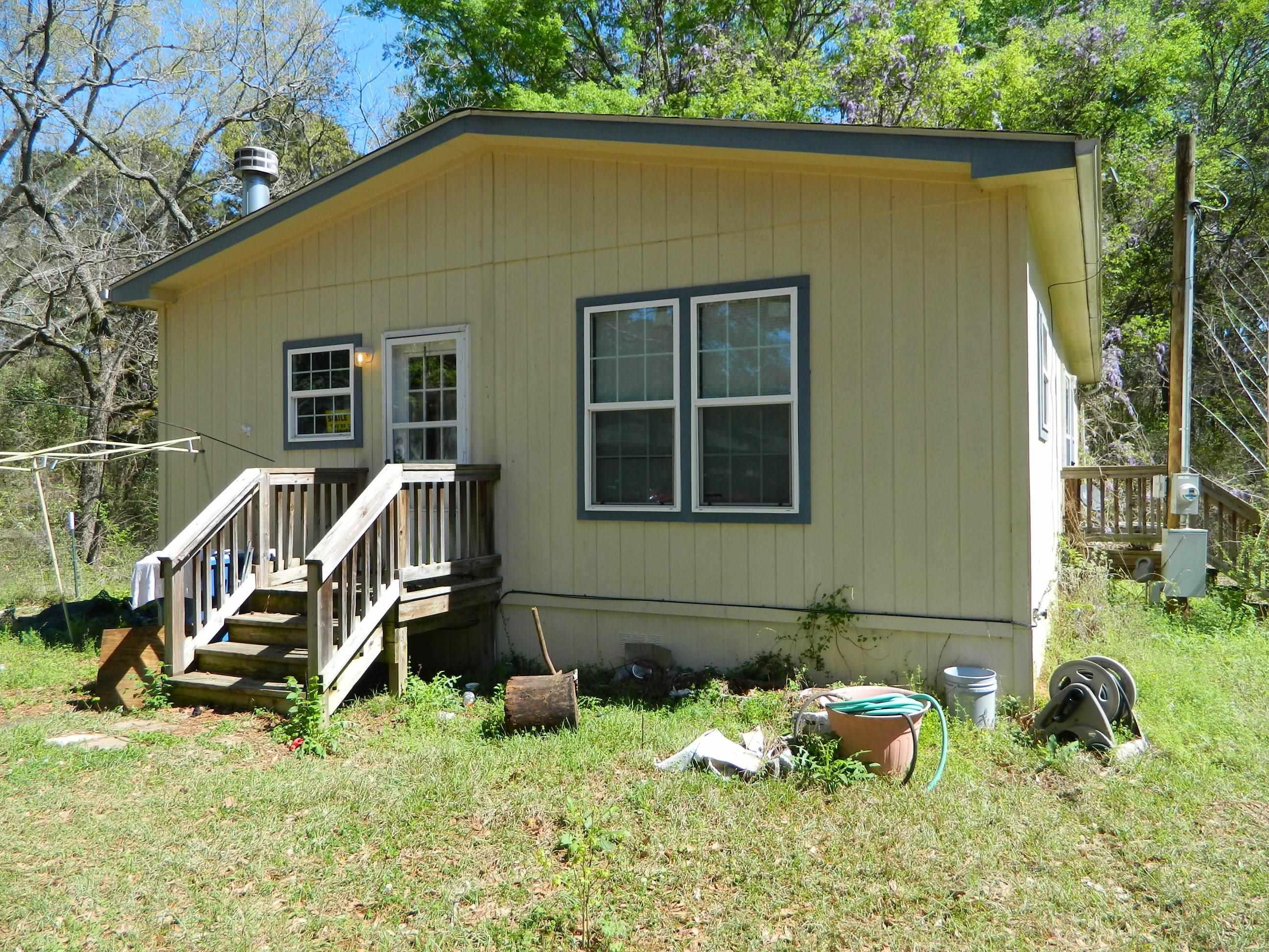 Image 0: View of front of property featuring a front lawn, Front Of Structure