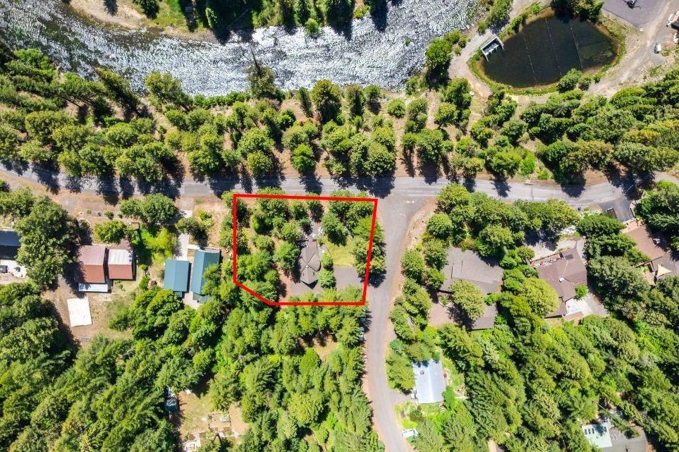 Image 2: Corner Lot on the Payette River, Across the street from the Payette River and in the heart of a quiet McCall residential neighborhood.
