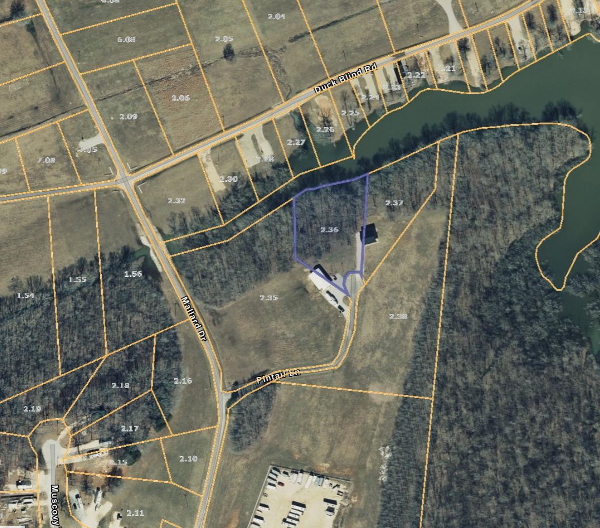 Image 1: Aerial view of property's location featuring property boundaries highlighted