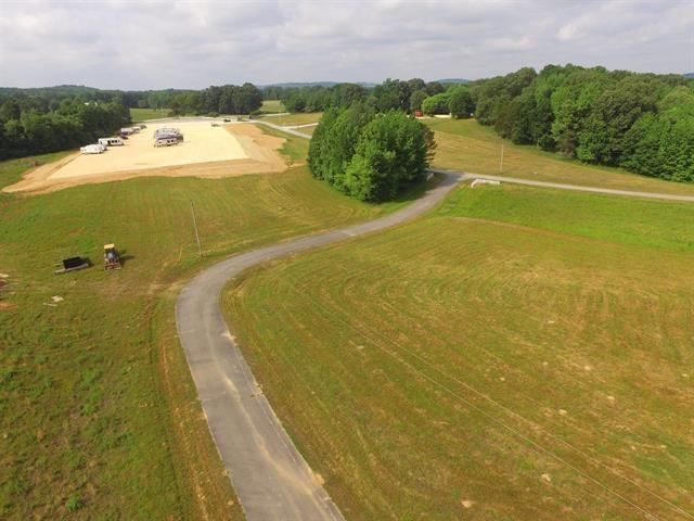 Image 4: View of rural area featuring large plots for crops