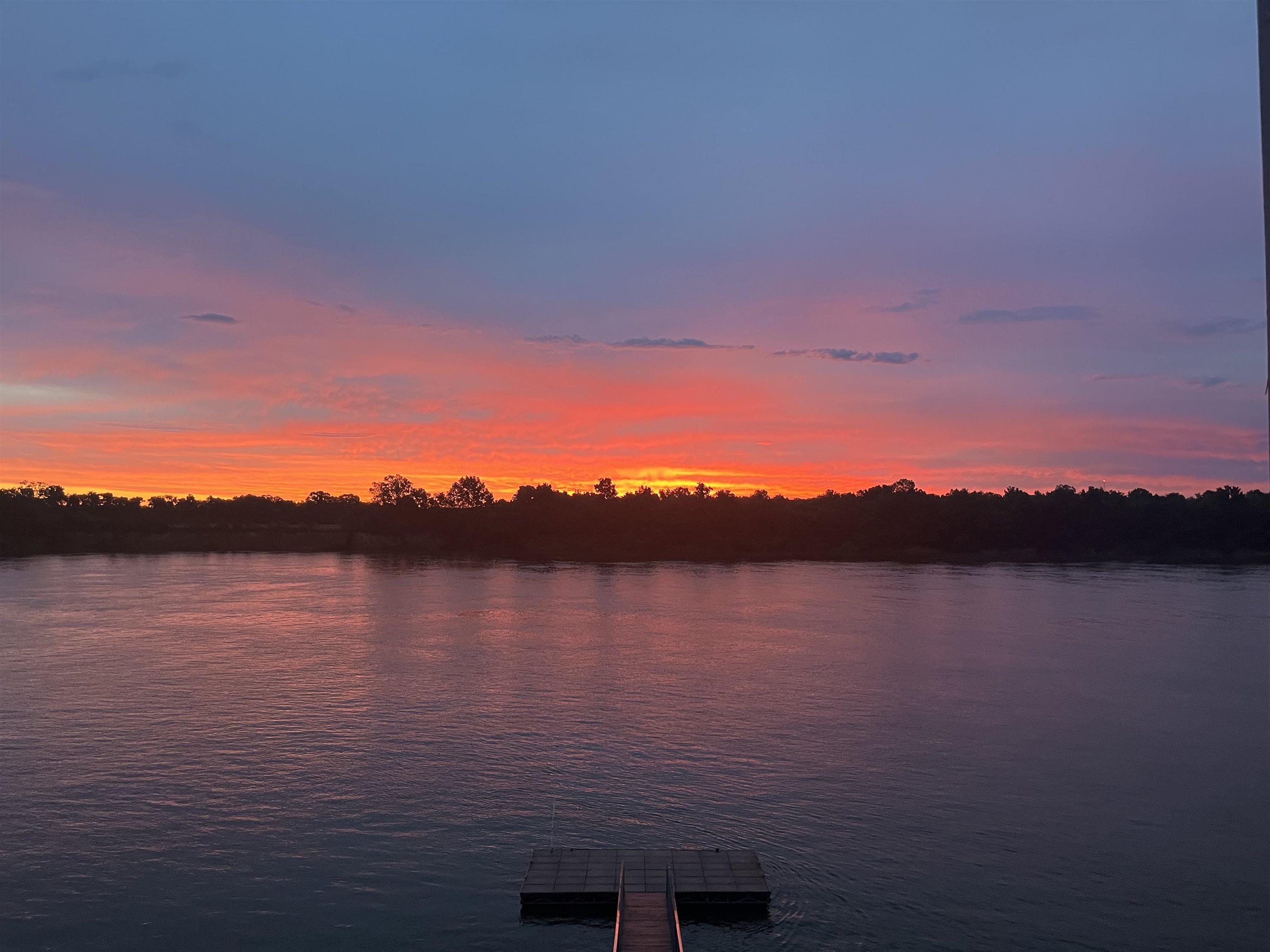 Image 1: Water view with a floating dock