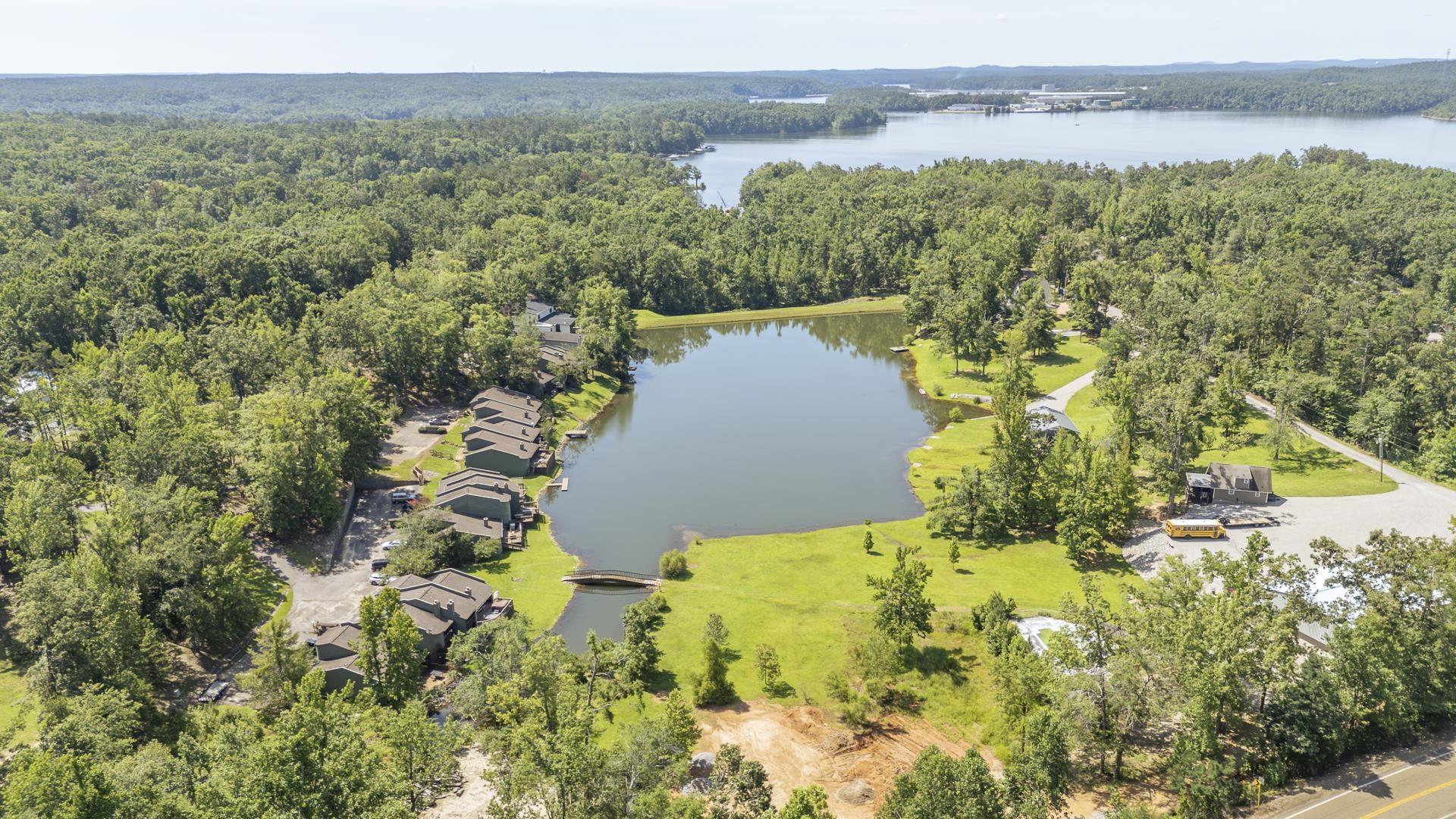 Image 2: Expansive property featuring a private lake and surrounding woodland.  The large body of  water is Pickwick Lake.
