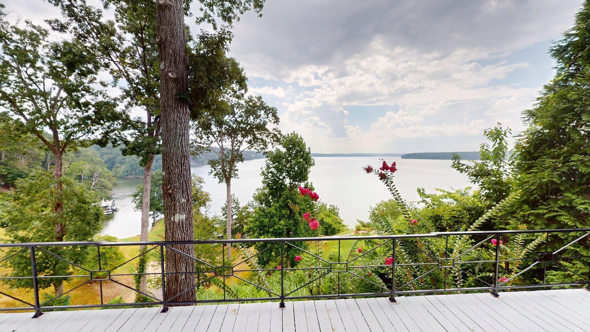 Image 1: Deck featuring a water view