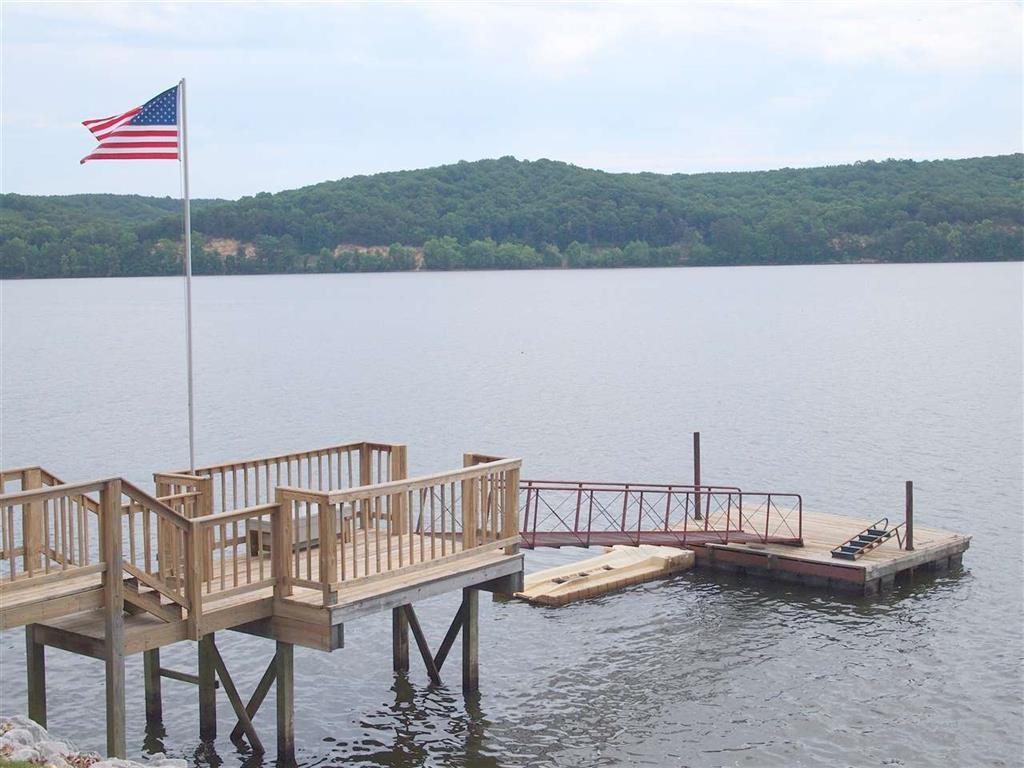 Image 4: Dock area featuring a water view