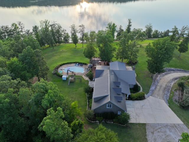 Image 1: If your looking for PRIVACY, Breathtaking Water Views, Beautiful Sunsets, and Land for Hunting-plus a Pool to relax and enjoy-look no further!!