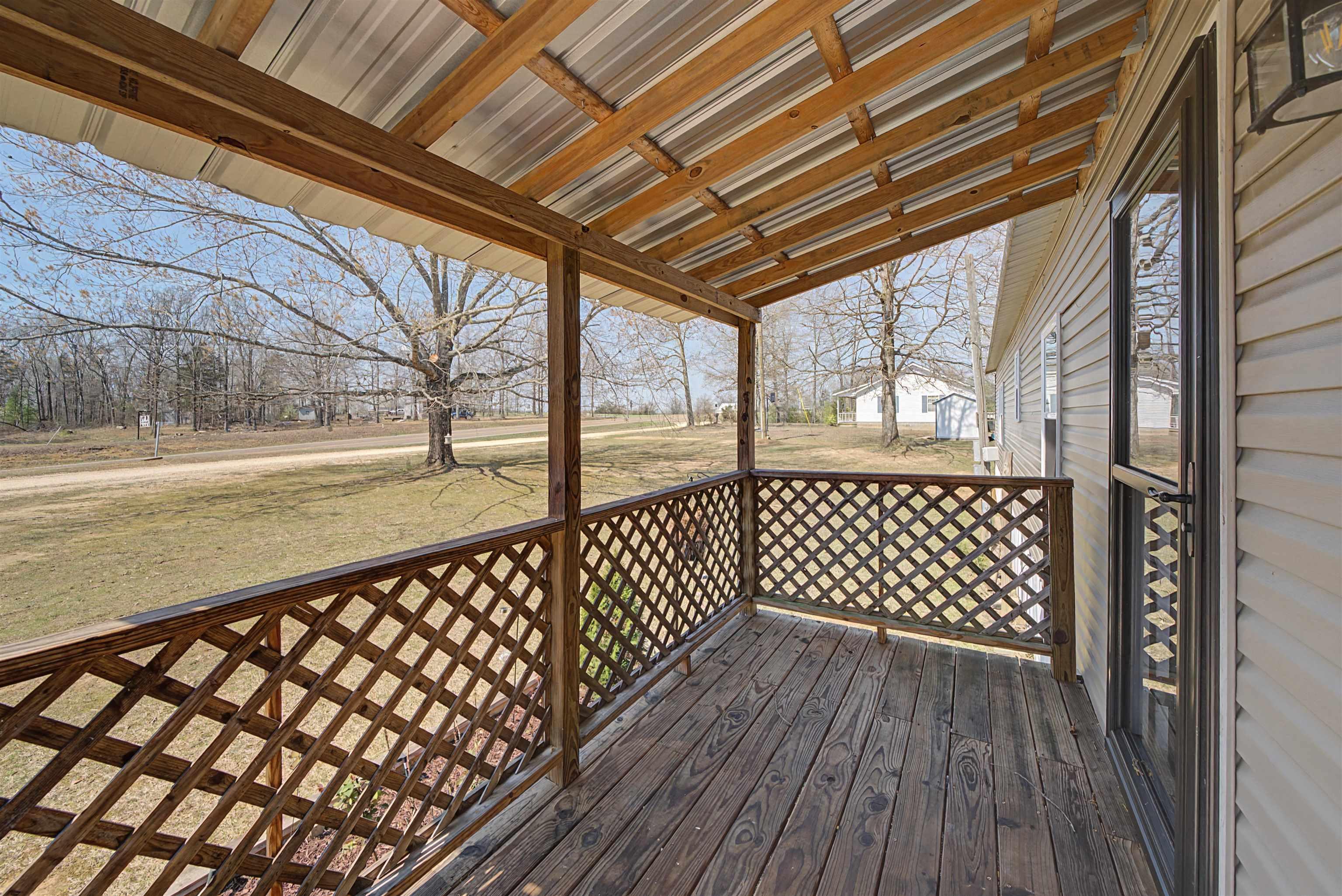 Image 3: Deck featuring a yard
