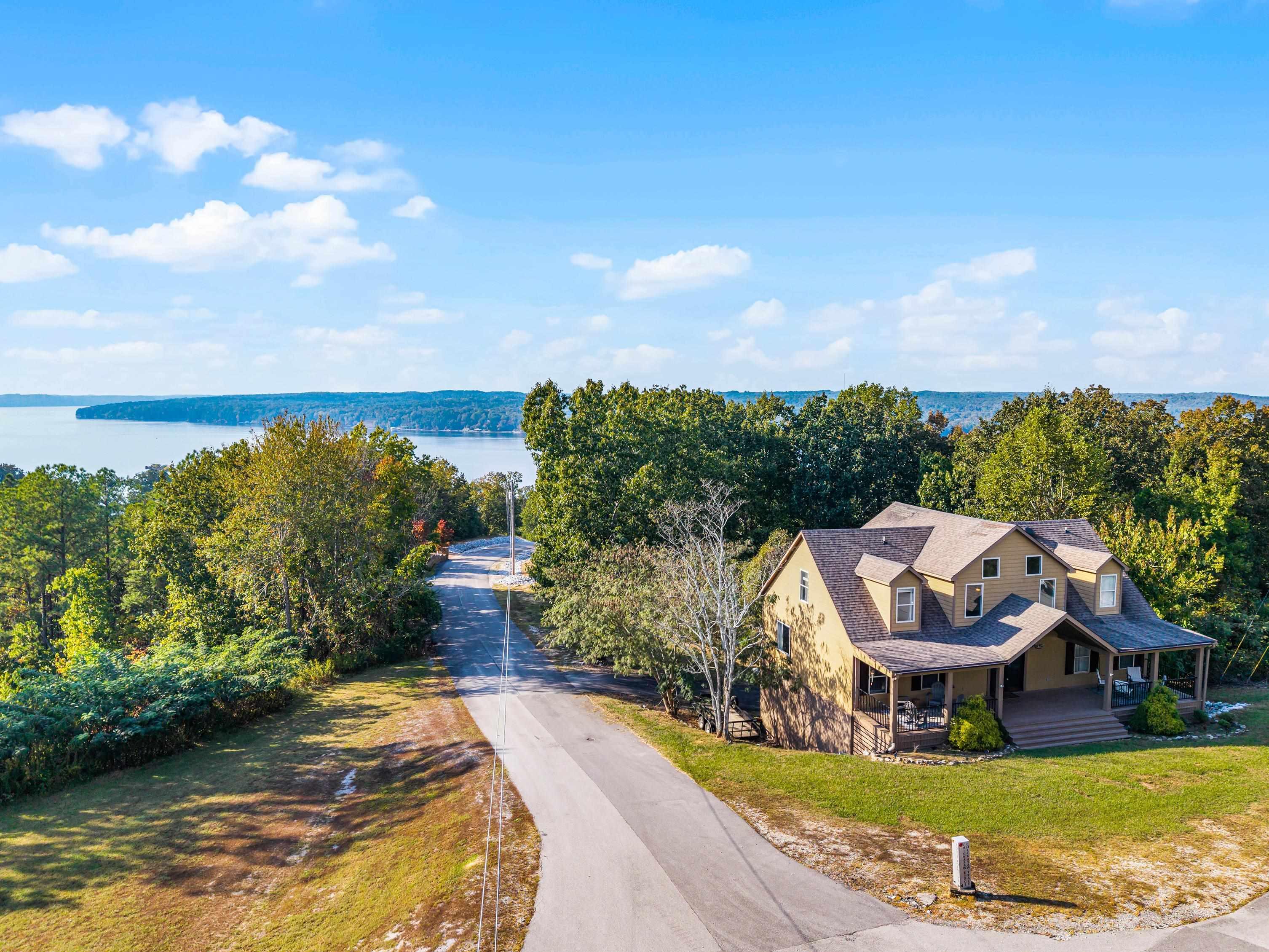 Image 2: View from above of property with a nearby body of water
