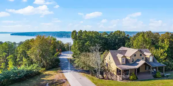 Image 2: View from above of property with a nearby body of water