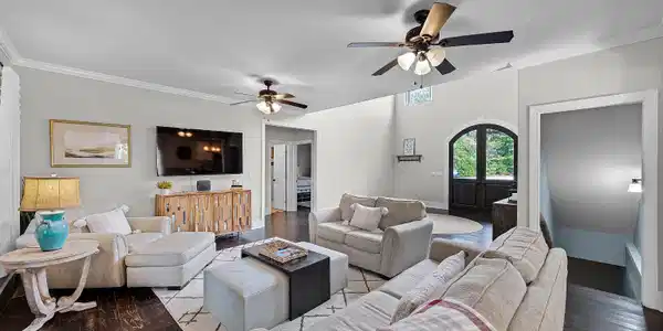 Image 4: Living room featuring ornamental molding, french doors, wood finished floors, and a ceiling fan