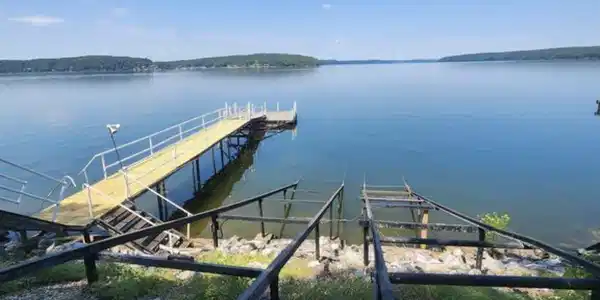 Image 2: Private dock extending into calm waters