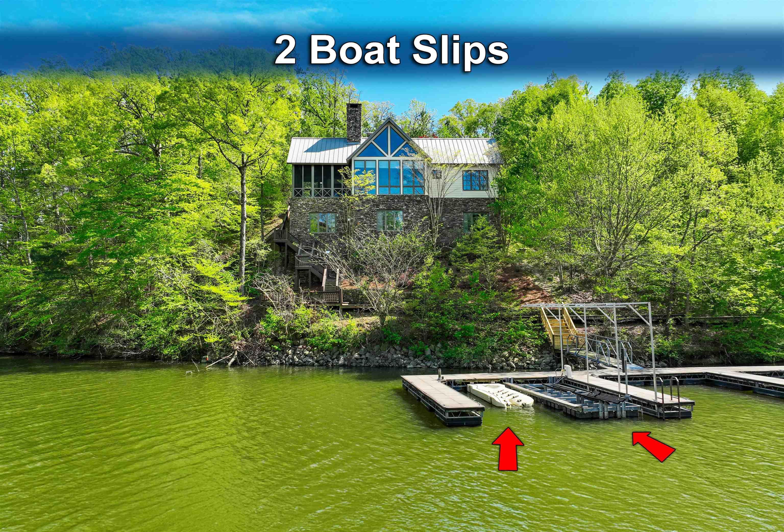 Image 1: Surrounding community with a floating dock and a water view