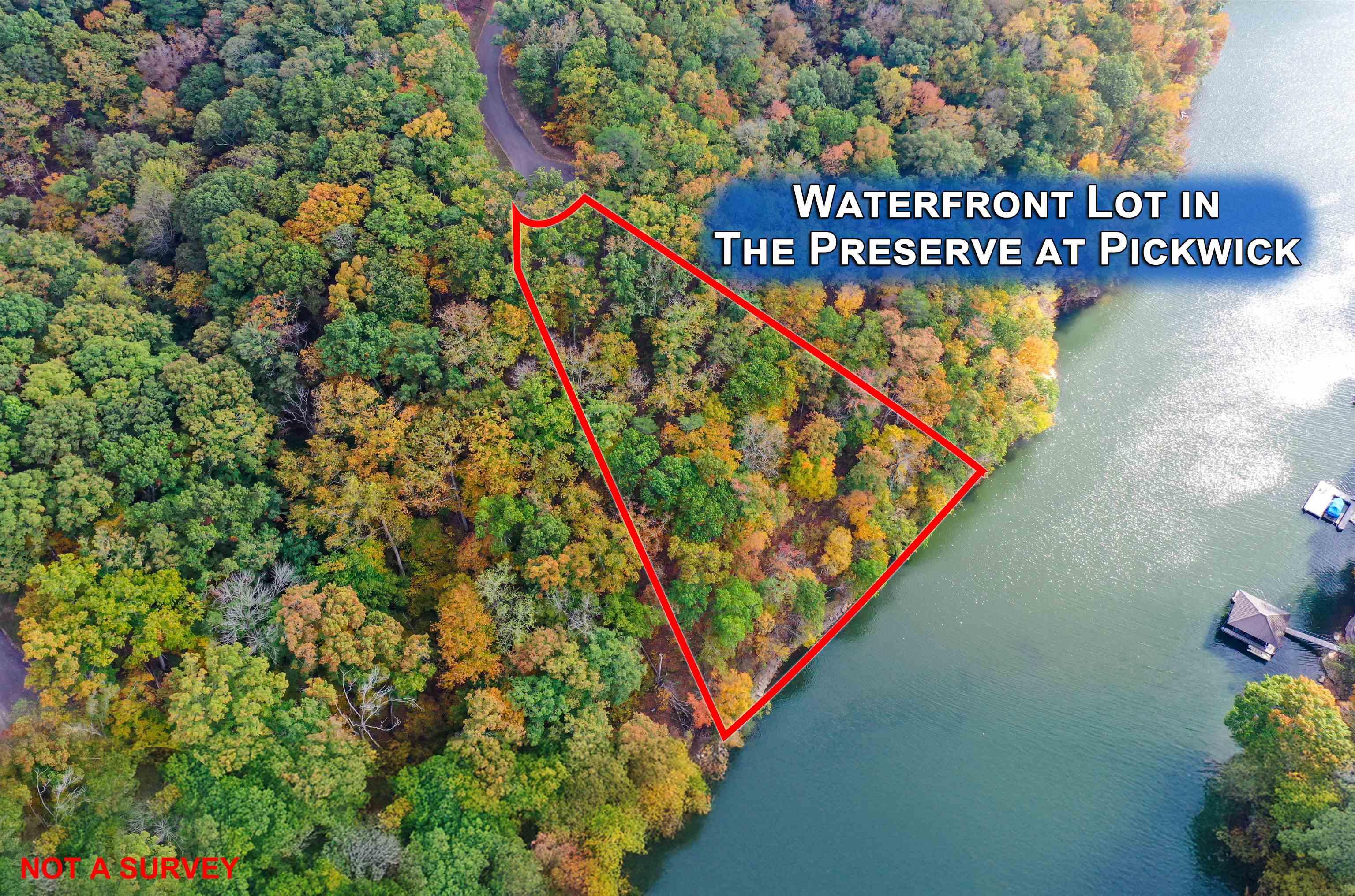 Image 1: Aerial view featuring a water view
