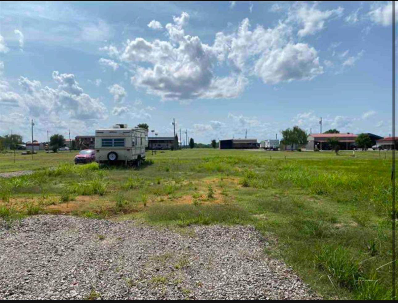 Image 1: View of yard featuring a rural view