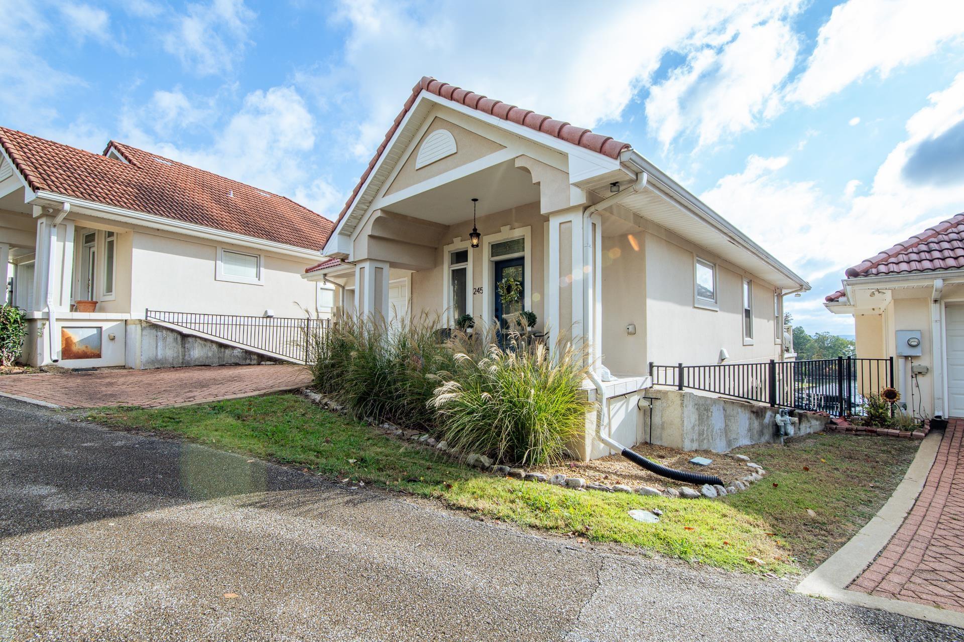 Image 2: Mediterranean / spanish home with stucco siding and a tile roof