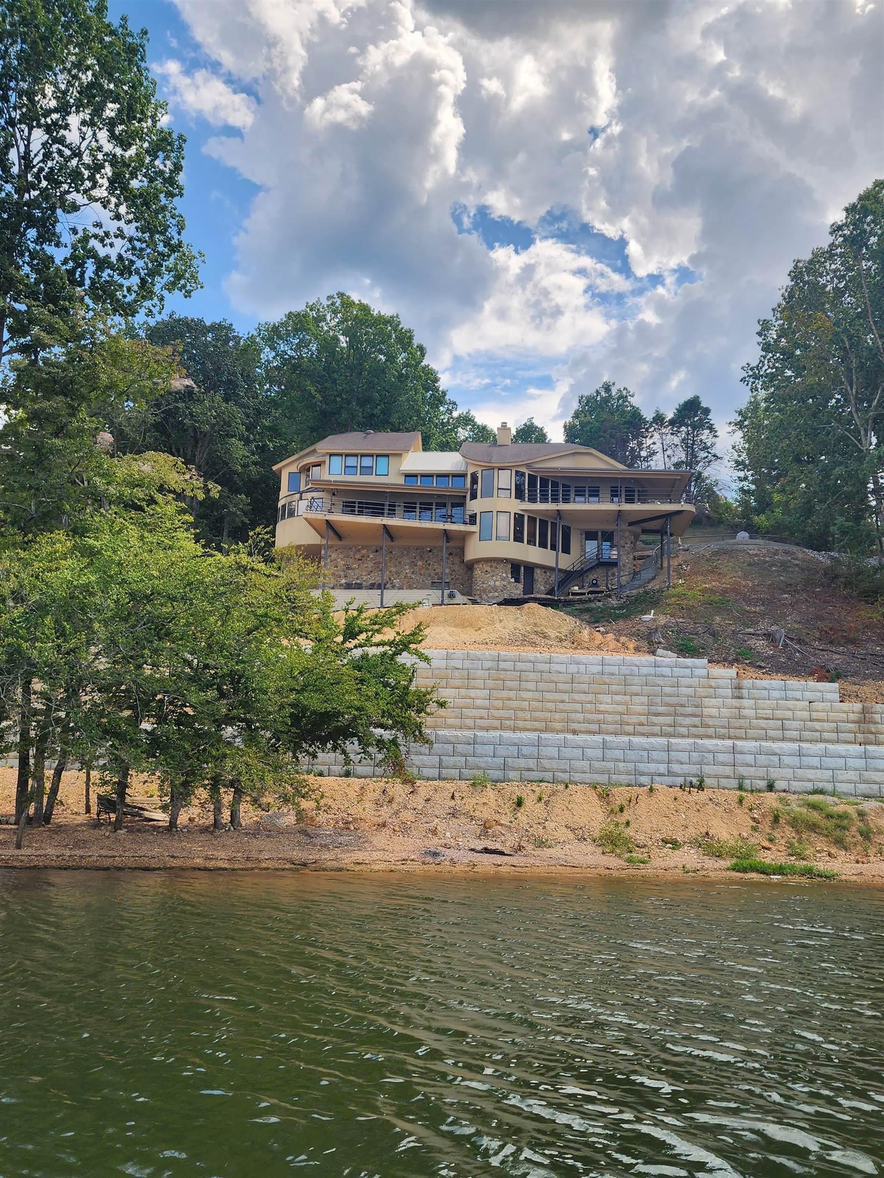Image 2: Water view featuring stairway