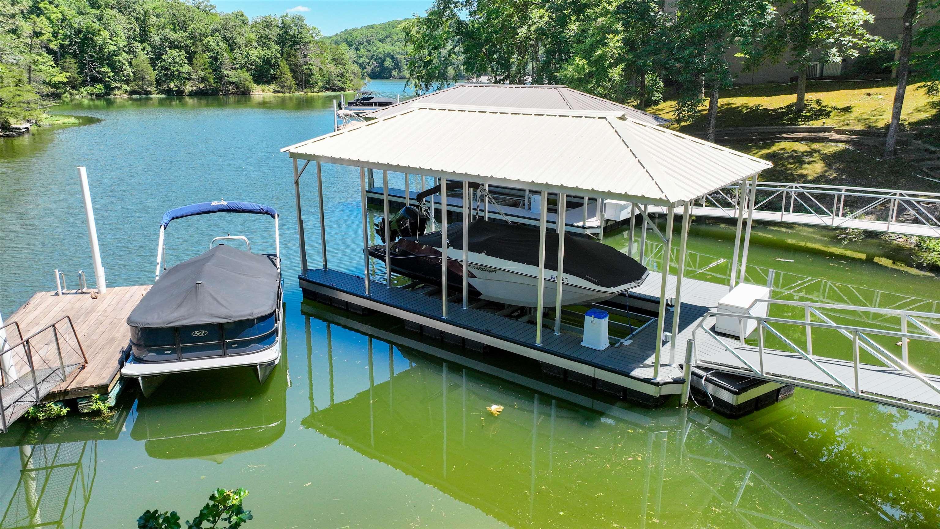 Image 4: Dock area featuring a water view