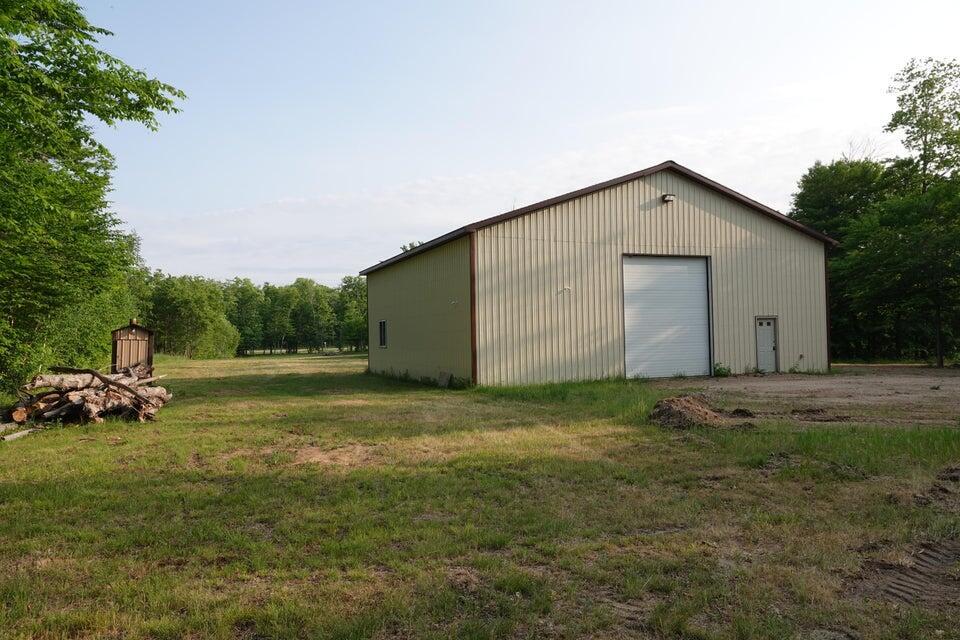 Image 1: pole barn and shows wood boiler