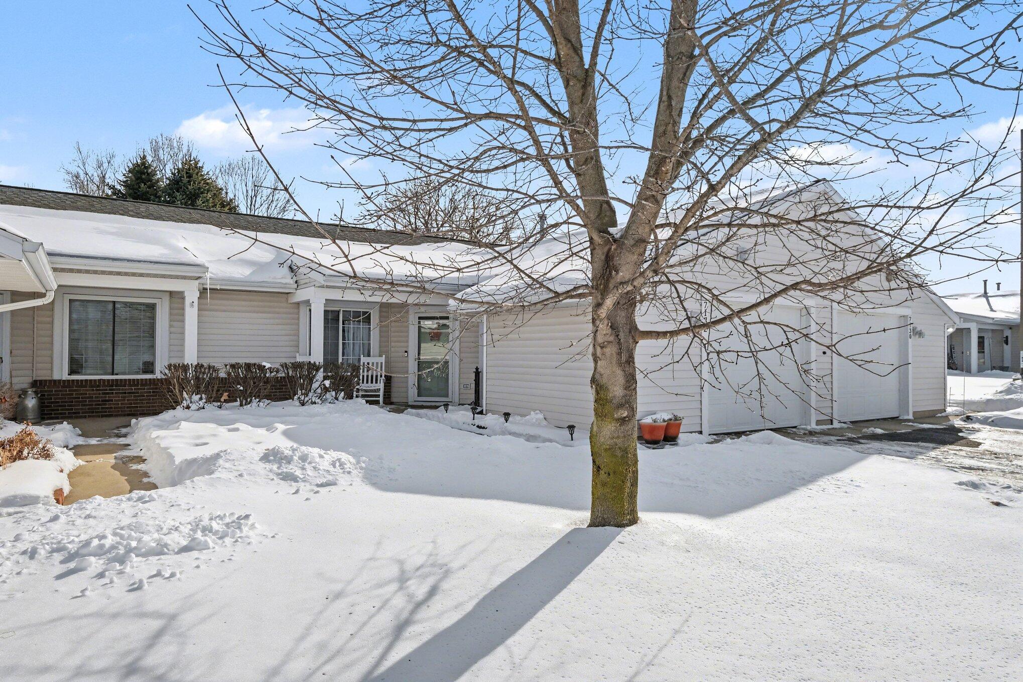 Image 3: Private Entrance & Attached Garage