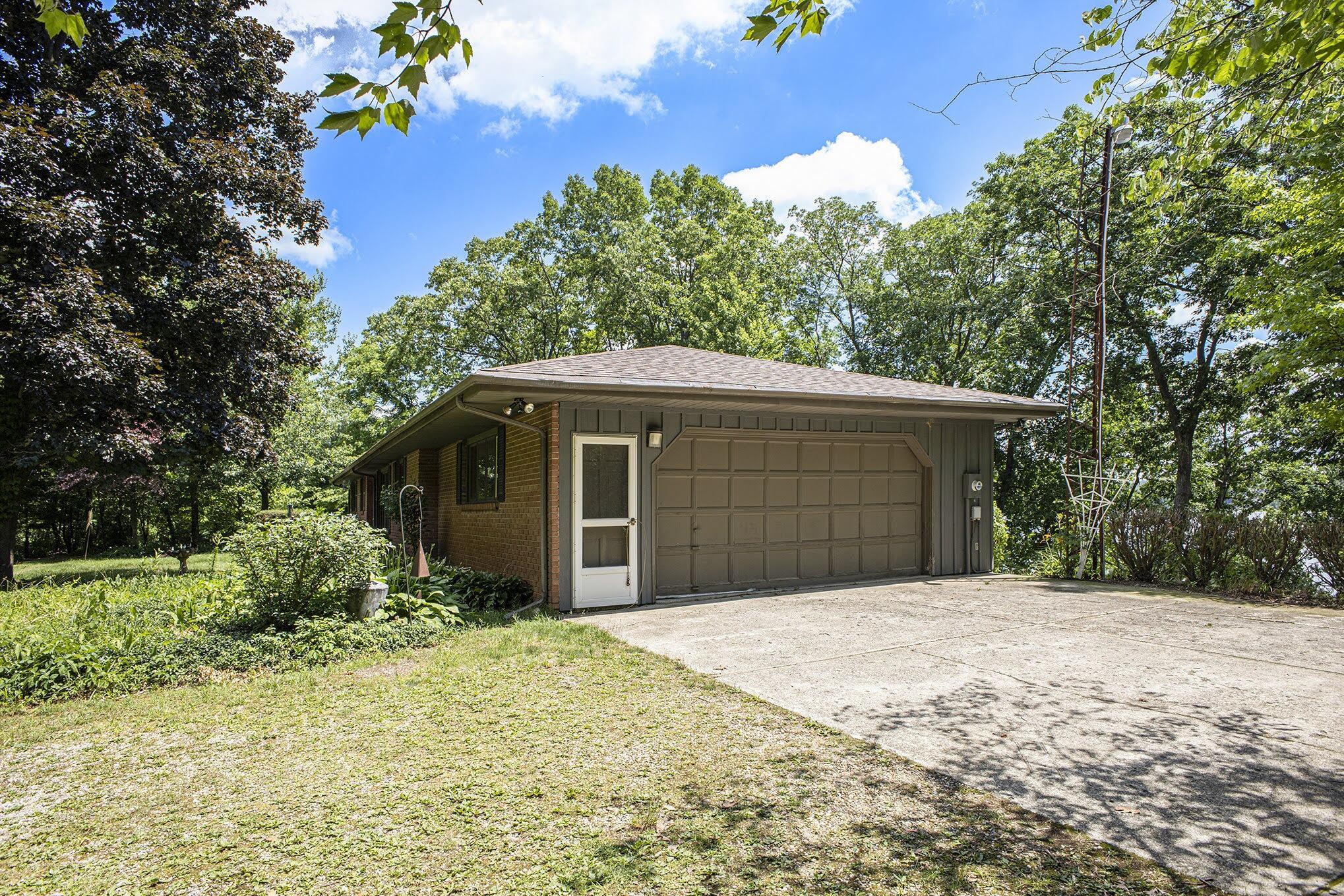 Image 3: EXTERIOR - ATTACHED GARAGE
