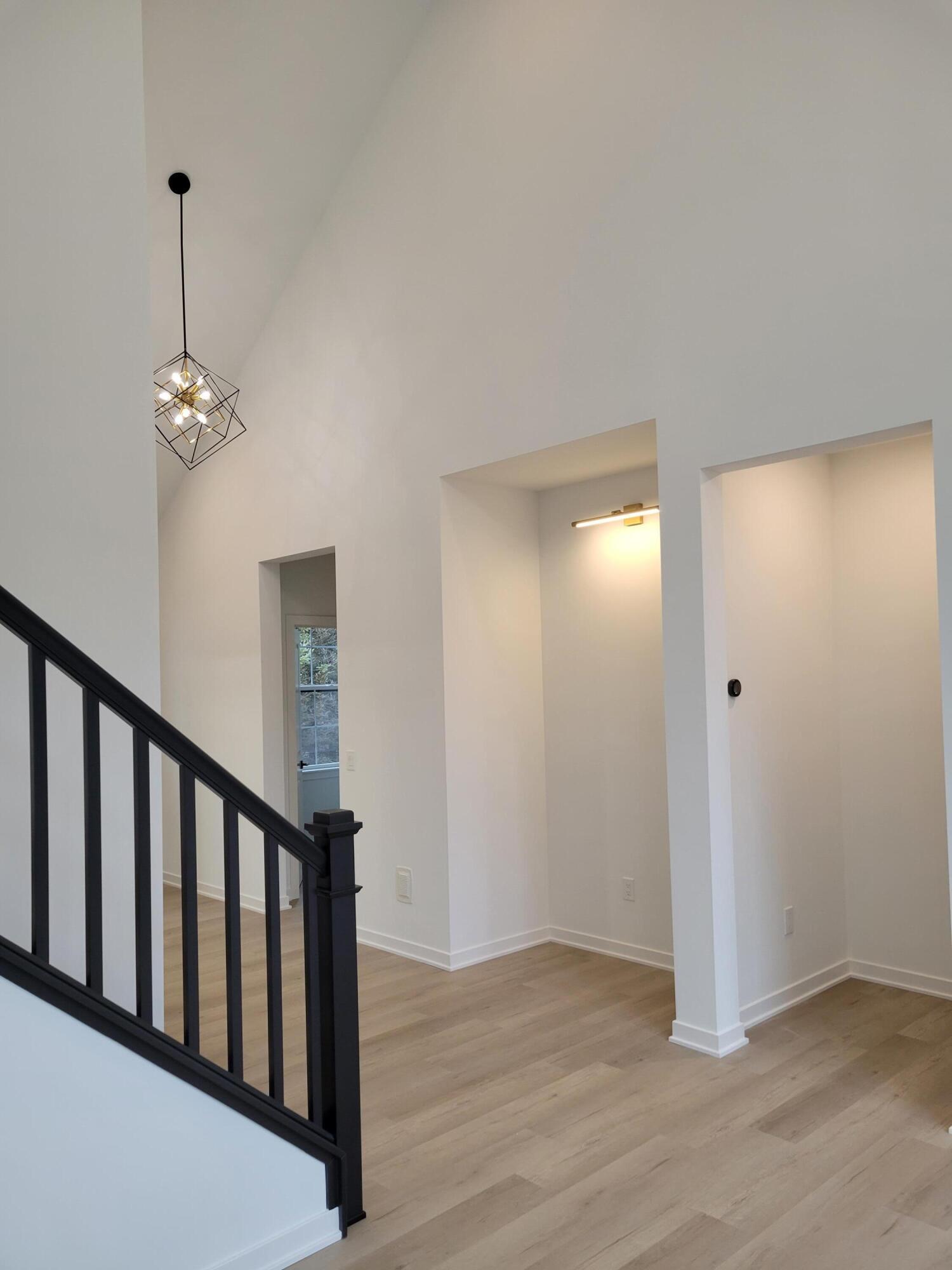 Image 2: Foyer and open railing
