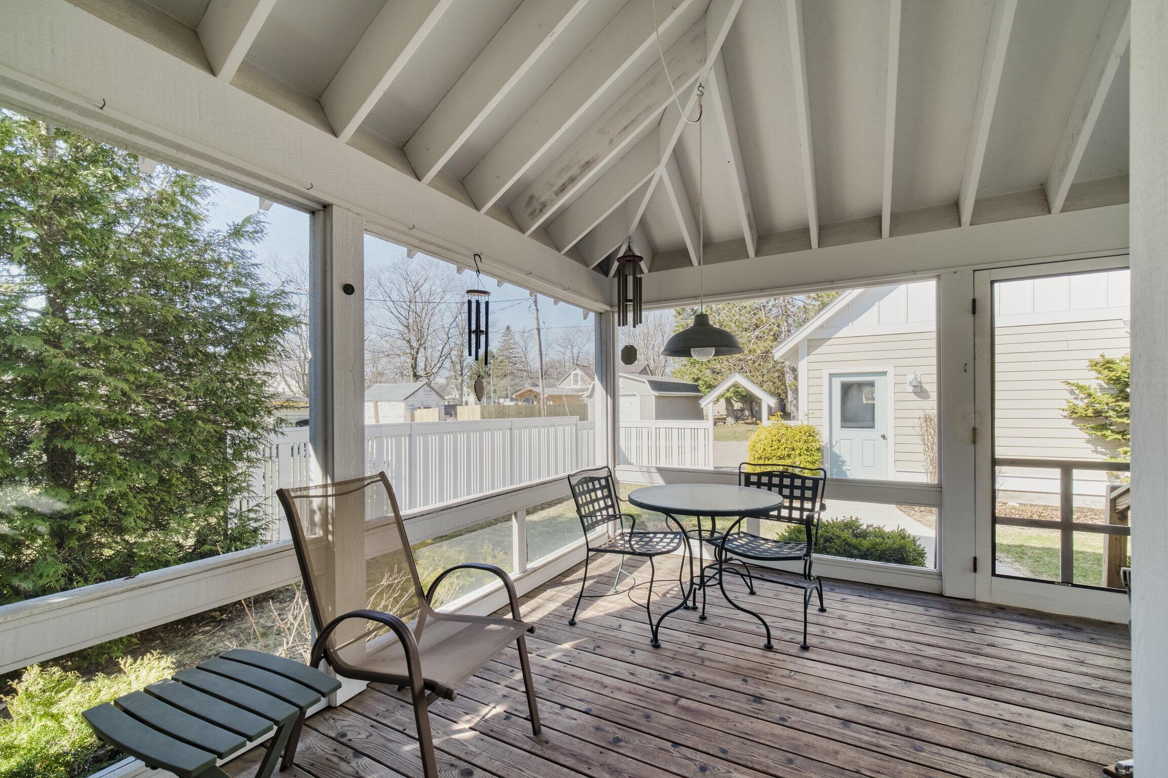 Image 4: Hear the waves from screened porch