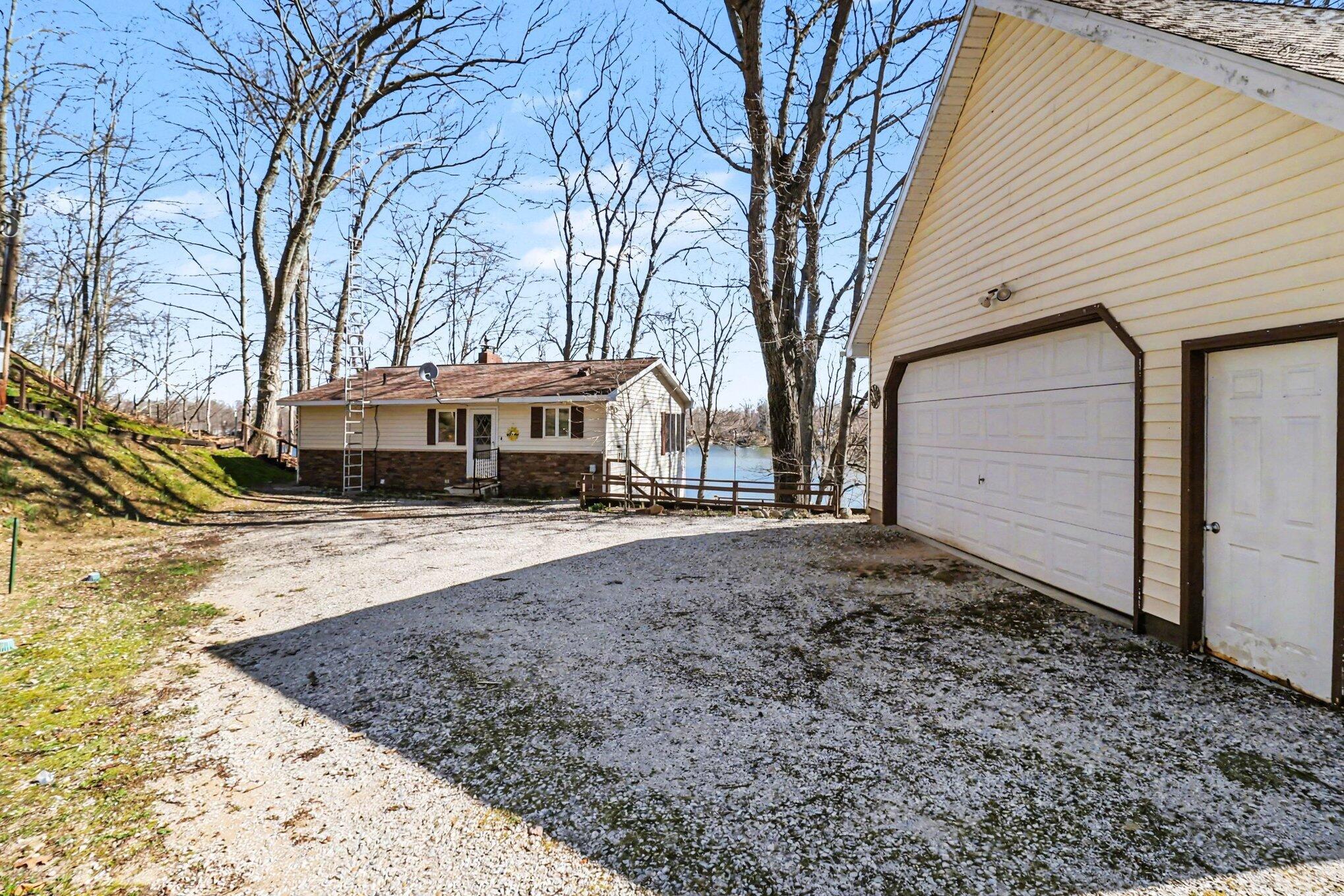 Image 3: Exterior - From Drive