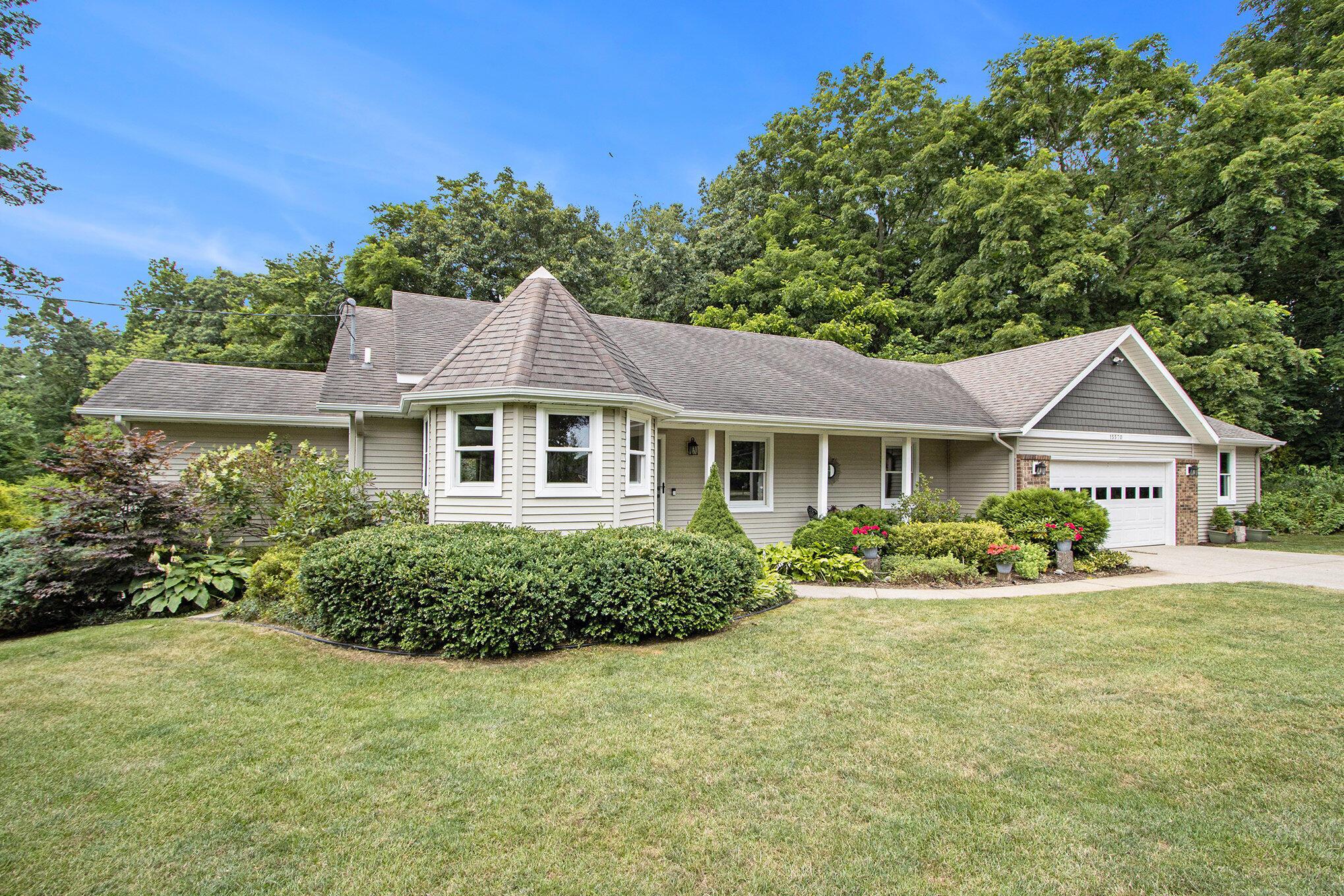 Image 1: walkout ranch /2 car garage