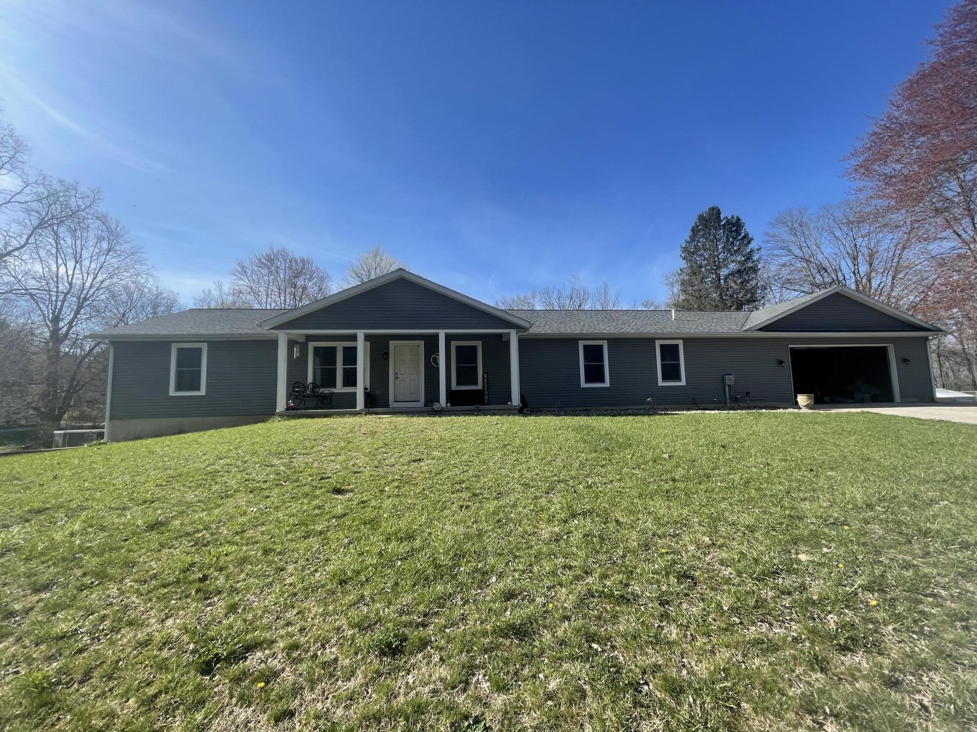Image 1: front of house