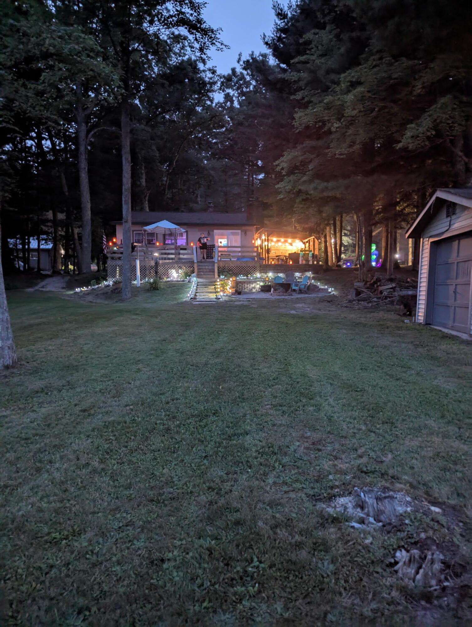 Image 1: view from lake to house