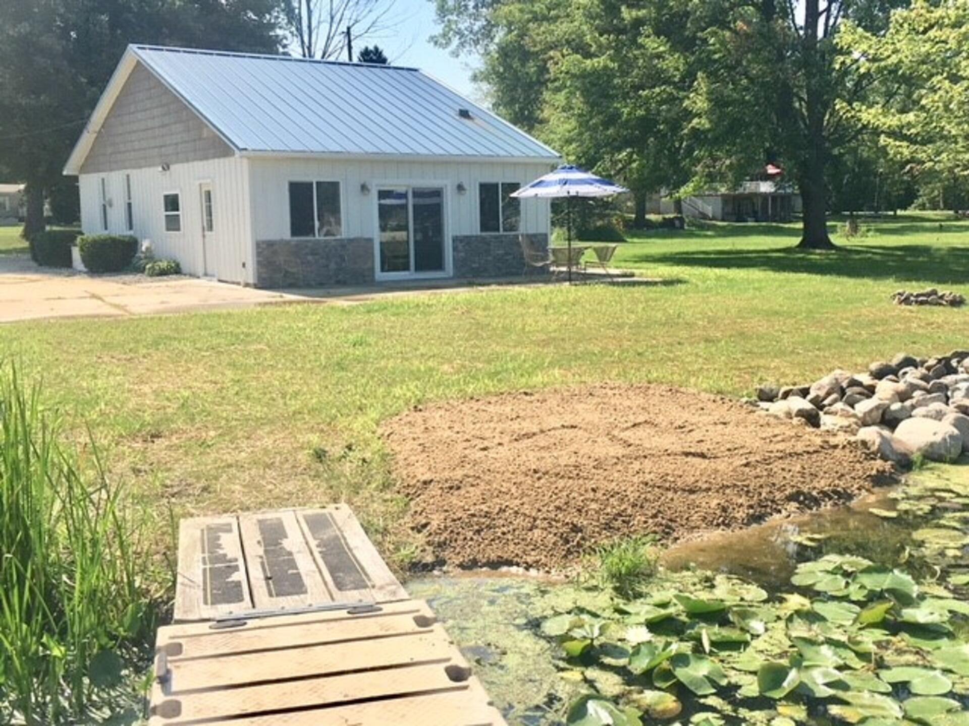 Image 2: cottage exterior beach